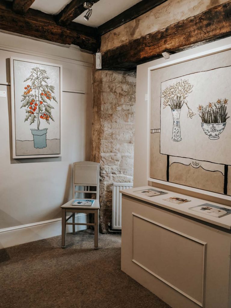 Floral paintings on display at the Brian Sinfield Gallery.