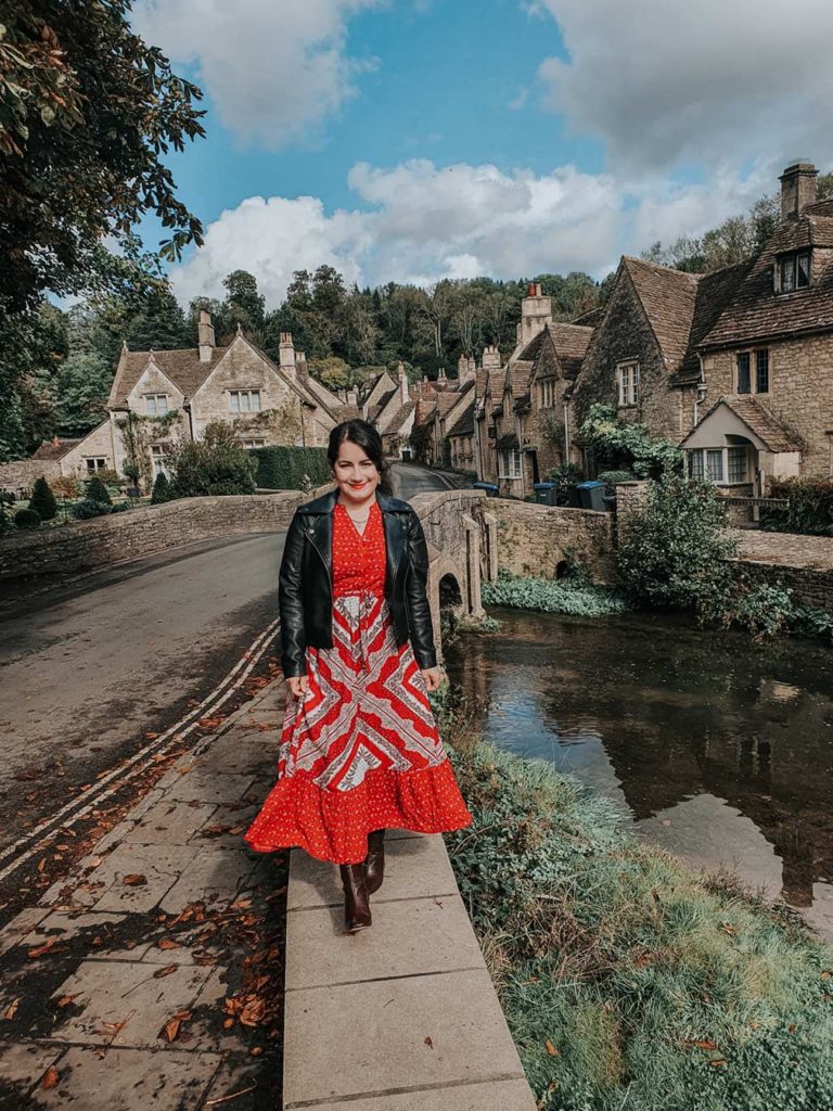 Lauren walking along the historical bridge standing over the River Bybrook.