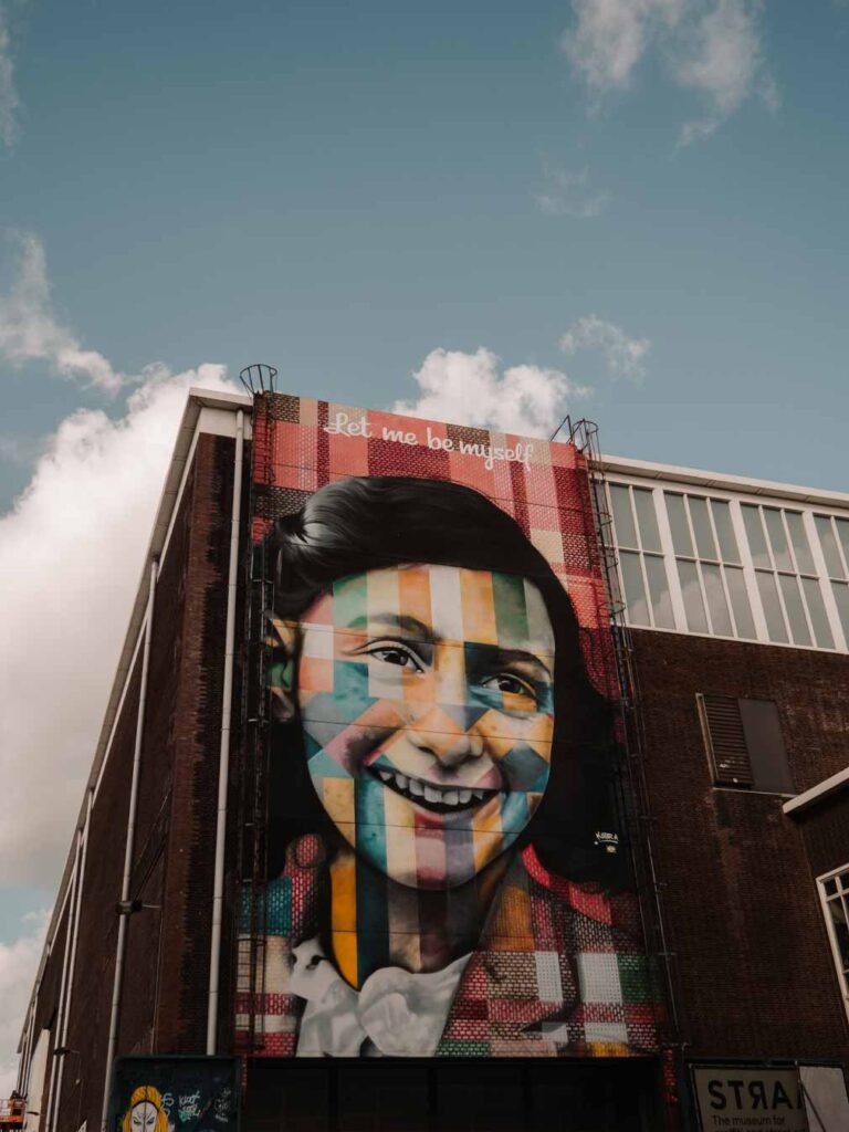 let-me-be-myself-anne-frank-mural-next-to-the-straat-museum-in-amsterdam