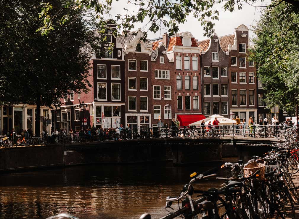 canals and crooked buildings in amsterdam