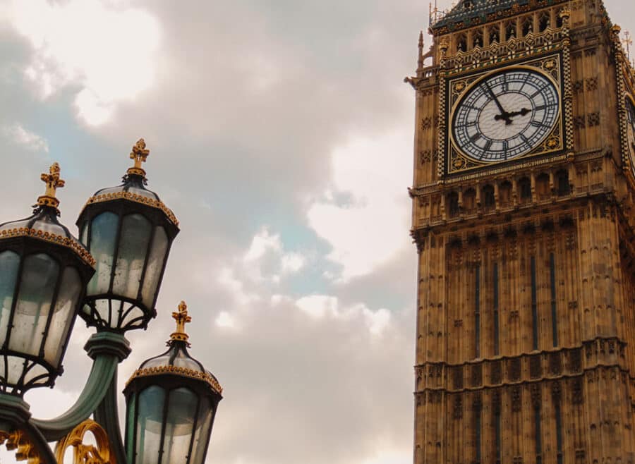 A view of Big Ben and a lantern along Westminster Bridge.