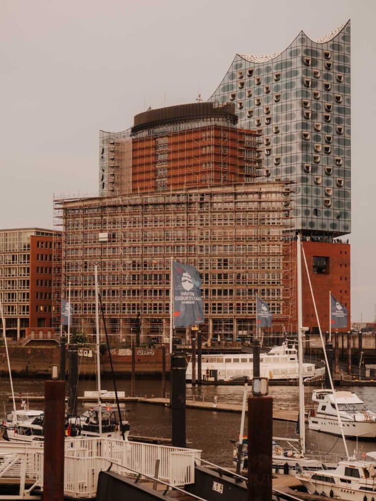 Views of the exterior of Elbphilharmonie in Hamburg, Germany on a grey and rainy day.