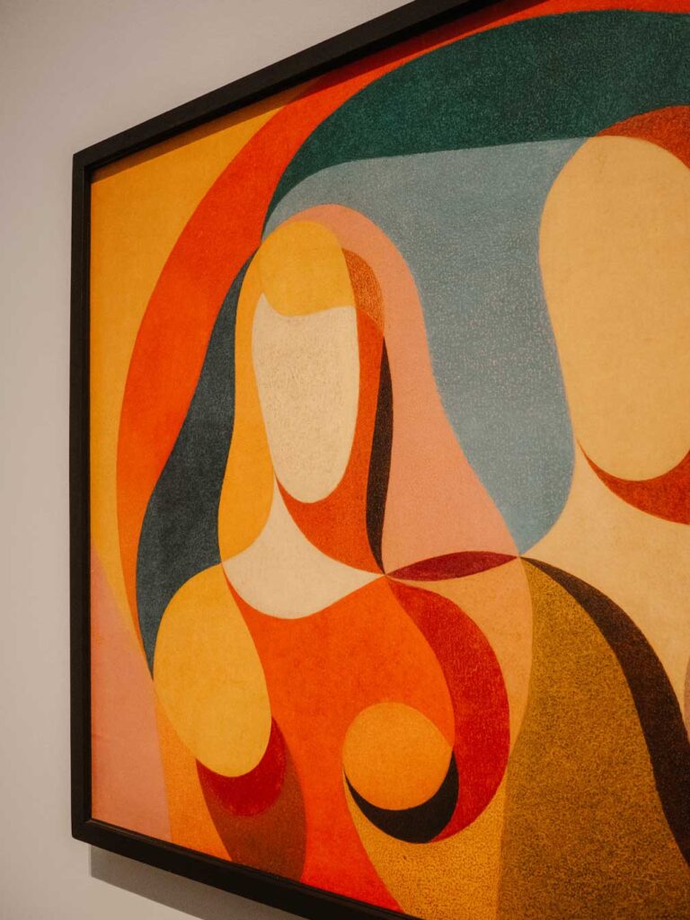 Man and Woman by Heinrich Hoerle on display in Hamburg. It's a very colouful artwork painted in a range of colours including pink, red, yellow, blue and teal.