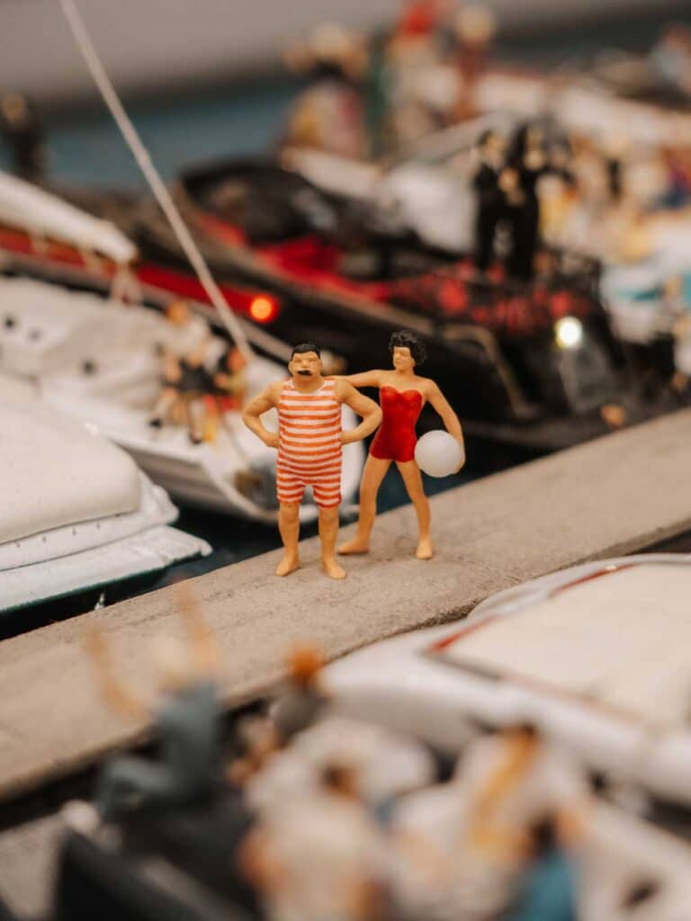 A mini model of a man and woman wearing swimwear at Miniatur Wunderland.