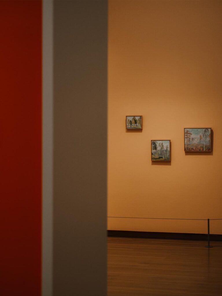 Art on display at the Stedelijk Museum with brightly coloured walls.