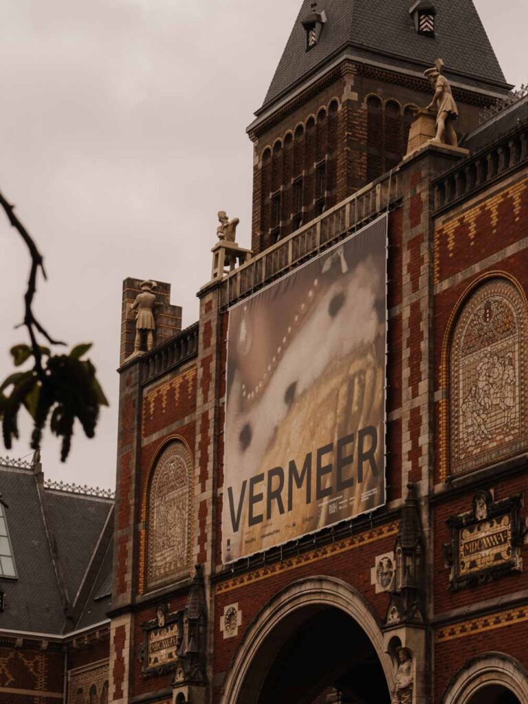 The exterior of the Rijksmuseum on a rainy day.