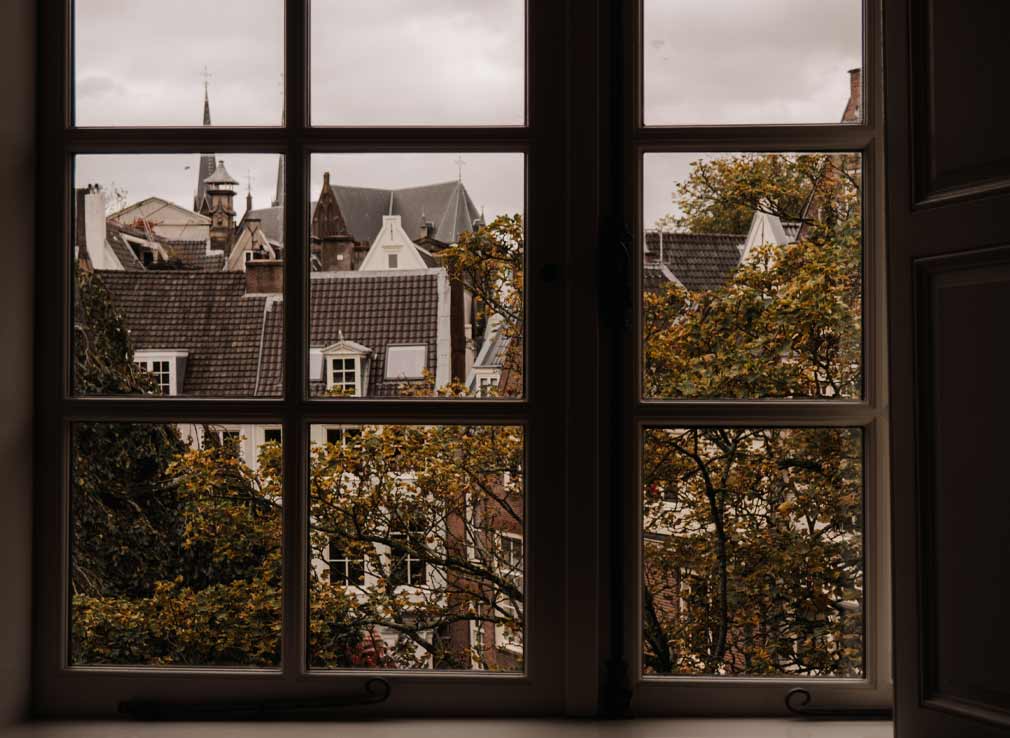 Views of Amsterdam rooftops in autumn.